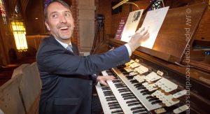 Organist at organ console Olivier Latry Our Lady of Refuge Church Kilgen